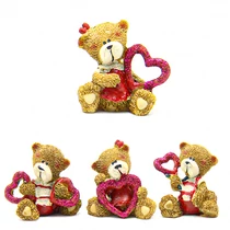 MACI ÜLŐ SZÍVVEL 4/720 5x4,5 cm 4 FÉLE MACI ÜLŐ SZÍVVEL 4/720 5x4,5 cm 4 FÉLE